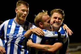 Sheffield Wednesday captain Barry Bannan (centre) is looking forward to the Owls' trip to Wembley.