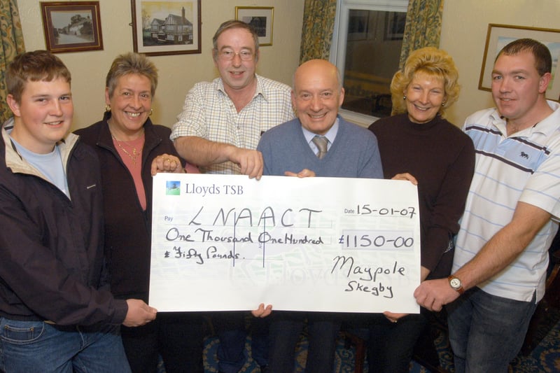 John Field, third right, receives £1,150 for the Lincolshire and Nottinghamshire Air Ambulance which was raised over Christmas 2006 at The Maypole at Skegby. Handing the money over were Tom Mattison, Sharon Cooper, Tony Miles, landlord, Christine Lakin and Richard Bates.