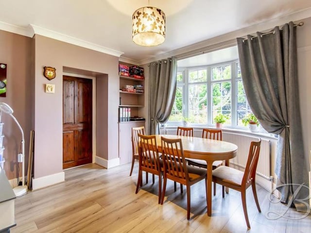 Across now to the lovely dining room. It comes in handy when bringing together even the busiest of families for dinner.