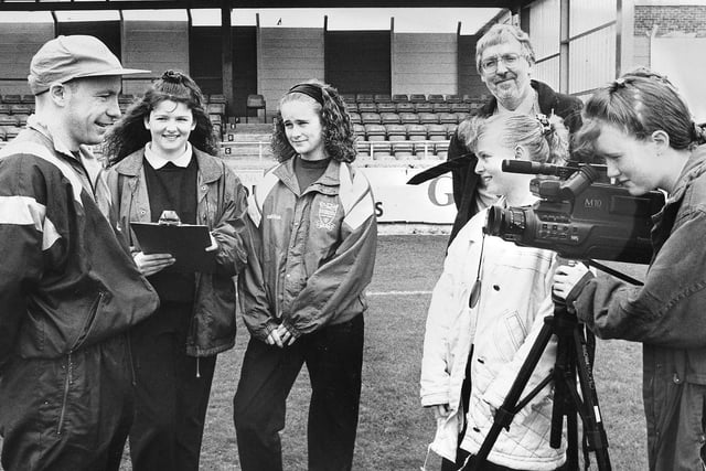 Hartlepool United Star Brian Honour was interviewed by pupils from Brierton School at the Victoria Ground as part of their anti-vandalism video project back in May 1993.
Pictured (left to right) are Joanne Sullivan, Gemma Waggott, Claire Noble and Laura Hill along with teacher Brian Smith.