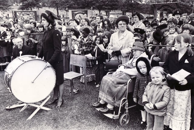 Children and grown-ups of all ages gather in Meersbrook Park for the anuual Whit Sing, led by the big drum and the band of the Salvation Army - 29th May 1977