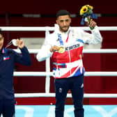 Great Britain's Galal Yafai (right) celebrates with the gold medal and Philippine's Carlo Paalam with the silver model after the Men's Fly (48-52kg) Final Bout at the Kokugikan Arena on the fifteenth day of the Tokyo 2020 Olympic Games in Japan (pic: Mike Egerton/PA)