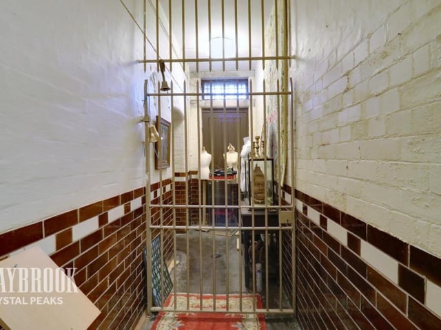 The original features include this cell door, which you can count on for security.