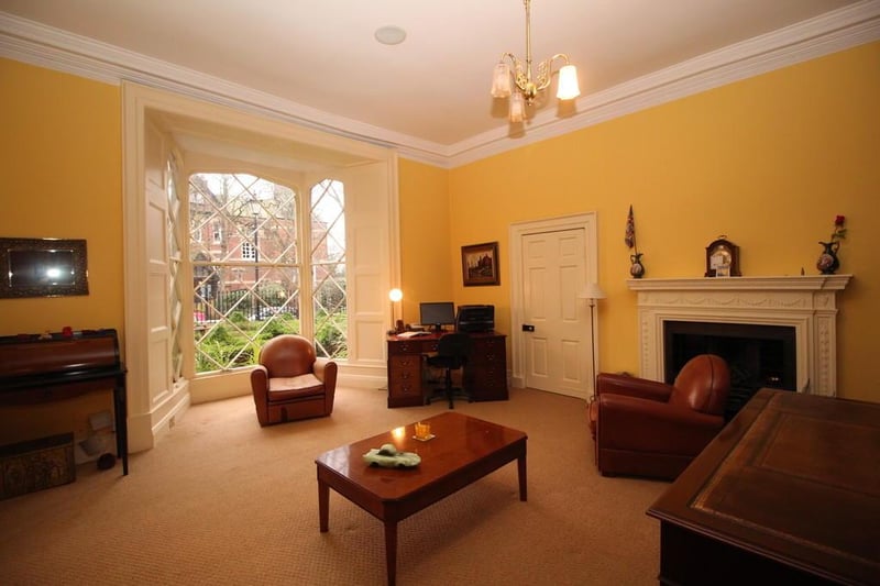 The study boasts large windows and a its own fireplace.

Photo: Rightmove