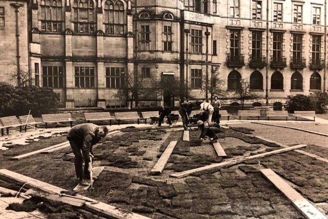 Workmen busy laying turf on the area in the St Paul's Garden's next to Sheffield Town Hall in March 1976. Dozens of seats were put in around the area and the grass area was  dug up and drained too