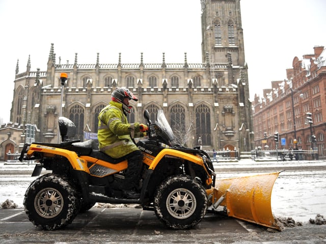 Pictured on Princes Street, Edinburgh, is a snow plough clearing the pavements. 19th December 2010.