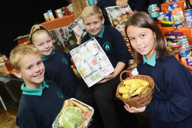 Preparing to take their Harvest Festival collections out into the community in 2013 were Balby Waverley primary school back l-r Lewis Ameri and Shante Wilkinson, both ten. Front l-r Dylan O'Donnell, Alice Graham, Nathan Clarke and Megan Downs, all ten.