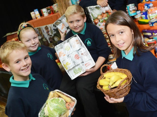 Preparing to take their Harvest Festival collections out into the community in 2013 were Balby Waverley primary school back l-r Lewis Ameri and Shante Wilkinson, both ten. Front l-r Dylan O'Donnell, Alice Graham, Nathan Clarke and Megan Downs, all ten.