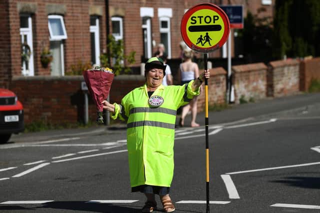 Treeton Lollypop lady, Glynnis Bolton, who has done the job for 20 years. Celebrates her 65th today.
Picture Jonathan Gawthorpe
24th April 2020.