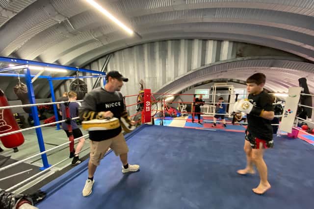 Tyler training with his dad, Peter, who is also his coach.