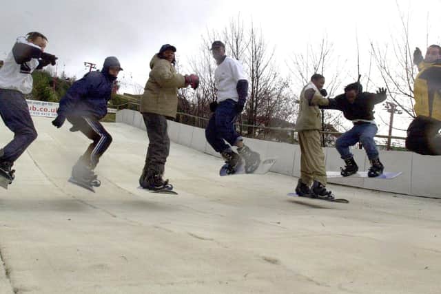 These kids from Firth Park Community College jump to it on their snowboard lesson at Sheffield Ski Village