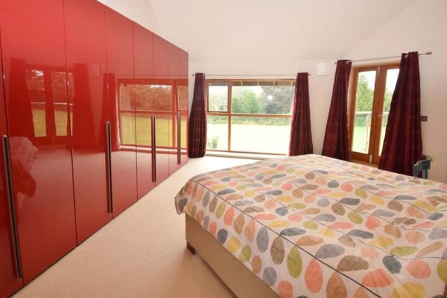 The master bedroom has French doors that open on to a balcony, which is the perfect spot for a morning coffee or evening glass of wine while taking in the beautiful countryside views. Fitted wardrobes and windows to the front and back are added bonuses.