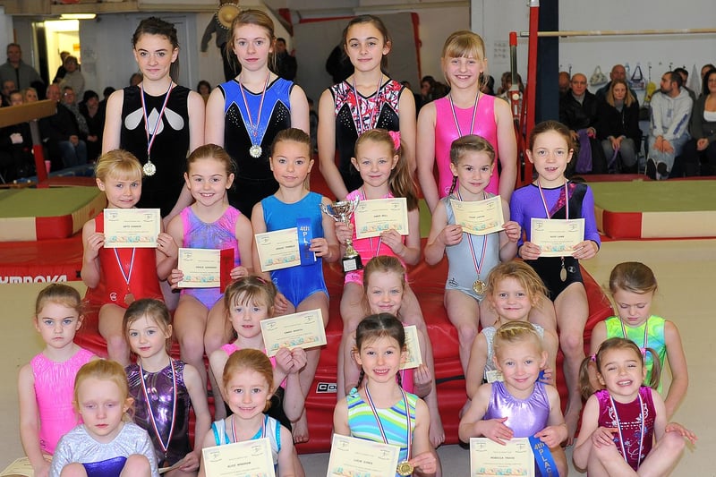 A talented line-up with the trophies they won during the Hartlepool Gymnastics Club competition in December 2010.