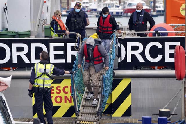 Protests will held in Sheffield against deportations and the hostile environment faced by migrants, in the wake of the row over flights to Rwanda. In the picture. a group of people thought to be migrants are brought in to Dover, Kent, following a small boat incident in the Channel. Picture date: Monday April 18, 2022. PA Photo. Under a scheme designed to crack down on migrants landing on British shores after crossing the Channel in small boats, the UK intends to provide those deemed to have arrived unlawfully with a one-way ticket to Rwanda. See PA story POLITICS Immigration. Photo credit should read: Steve Parsons/PA Wire