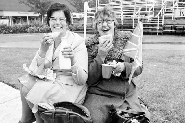 These two ladies had picked their spot at the War Memorial to get a glimpse of the Queen during her visit to the town in 1977.