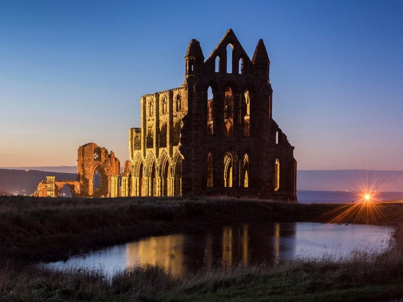 The dramatic, gothic ruins of Whitby Abbey are said to be haunted by the ghost of a nun who was walled up alive. The area is also associated with Dracula, and visitors have reported an unsettling atmosphere, particularly on windy nights. 👻 7.77/10