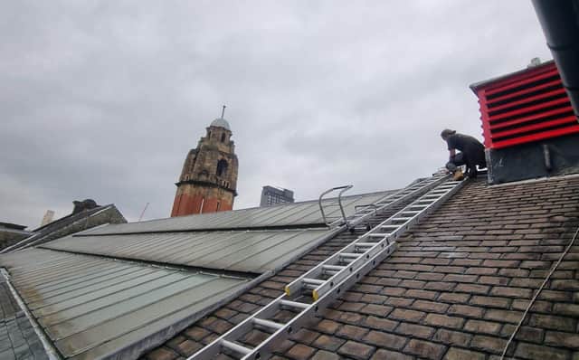 Work on the iconic Victoria Hall's roof is now completed