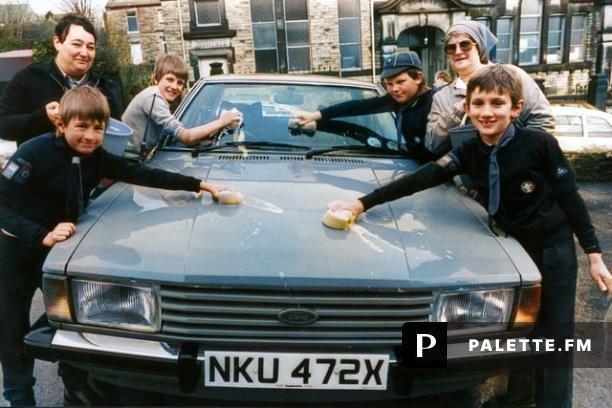 242nd Walkley Ebenezer cub scout company during their car wash service in the car park at Walkley medical Centre, David Fowleston, Robert Else, Mark Lilley, Leon Lakin, Gina McLennan and helper Beryl Carney. April. 13 1985. Picture: Sheffield Newspapers