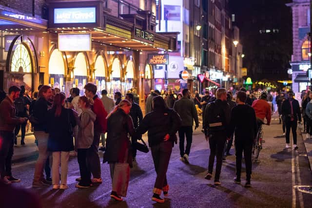 Crowds on the streets after being forced to leave bars and restaurants at 10pm due to the Government-imposed coronavirus curfew