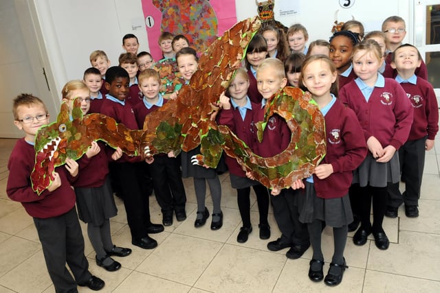 A colourful view in 2013 and it shows pupils at St Bedes RC Primary School, Jarrow with their winning autumn leaf collage at Bede's World. Who can tell us more?