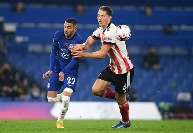 LONDON, ENGLAND - NOVEMBER 07: Hakim Ziyech of Chelsea battles for possession with Sander Berge of Sheffield United : Mike Hewitt/Getty Images