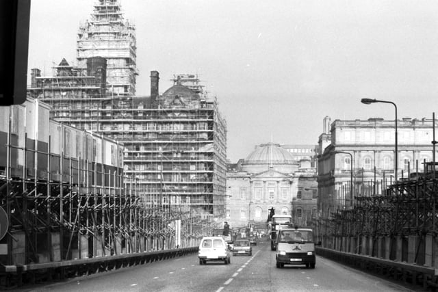 Scaffolding covers almost all of Edinburgh's North Bridge, including the Balmoral hotel in January 1990.