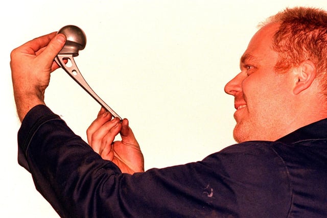 Precision forger Russell Marsden with a hip joint made from titanium 1 at Daniel Doncasters, Penistone Road in 1999