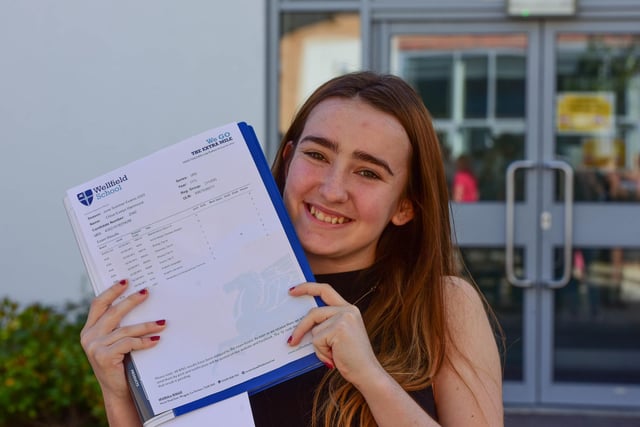 Chloe Hammond collects her results.