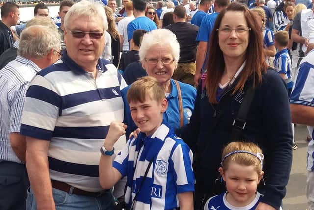 Craig's family at the 2016 Championship Play-off Final. Pictured is his mum and dad, Gail and Keith, wife Alana and two children, Taylor and Gracie.