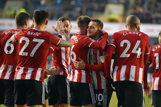 Goals from Mo Besic and Ollie Norwood booked Sheffield United's fifth-round place: Robin Parker/Sportimage