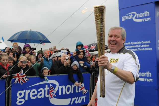 The Olympic Torch is carried on the Leas. Brendan Foster is watched by waiting crowds. Are you among them?