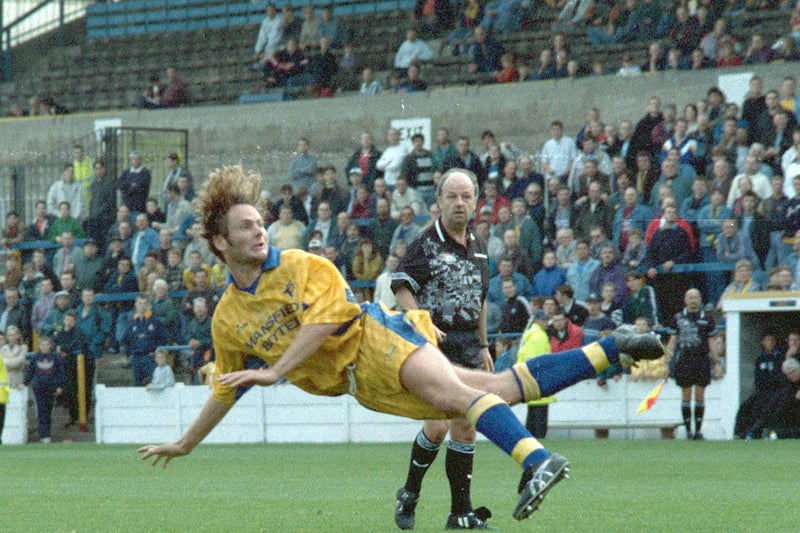 Ben Sedgemore flies in against Colchester United.
