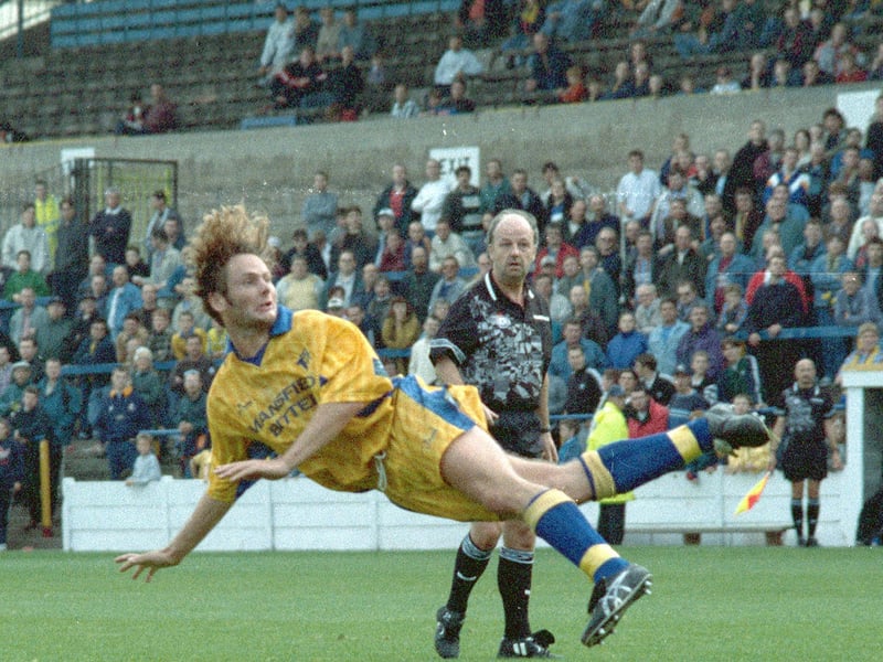 Ben Sedgemore flies in against Colchester United.