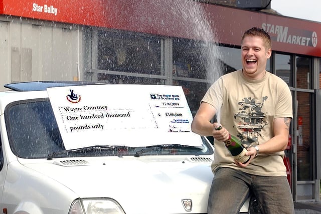 £100,000 lottery winner Wayne Courtney, aged 20, from Thorne, Doncaster celebrating his win in August 2004. He said his girlfriend Tracy had a dream a couple of weeks before, predicting the win and the exact amount