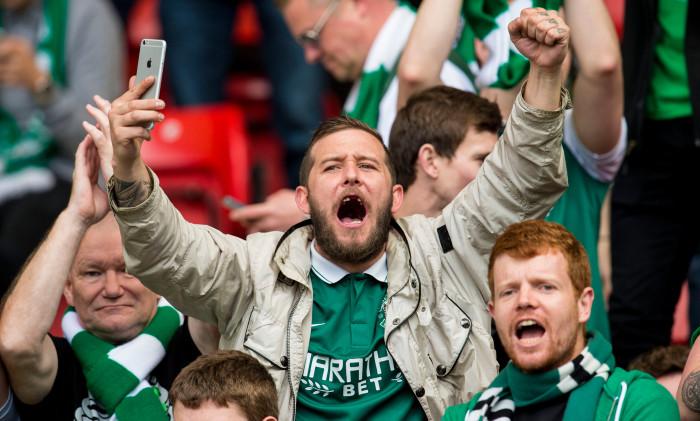 Fans recorded the celebrations and an epic rendition of Sunshine on Leith for future generations.
Picture: SNS