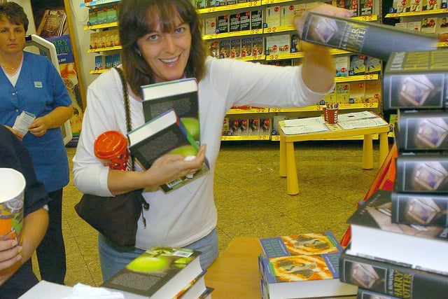 Claiming a copy of Harry Potter and the Half Blood Prince at WHSmith in Meadowhall,  July 2005