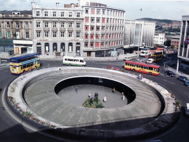 Many buildings in the vicinity of the Market Place were damaged or destroyed on the night of 12 December 1940, when German aircraft bombed Sheffield. The bomb sites were cleared but most remained empty for many years. In 1968 many old streets were cleared to make way for the new Arundel Gate, a dual carriageway road that terminated at a large roundabout built on the former market place. Underneath the roundabout a network of underpasses and shops was built