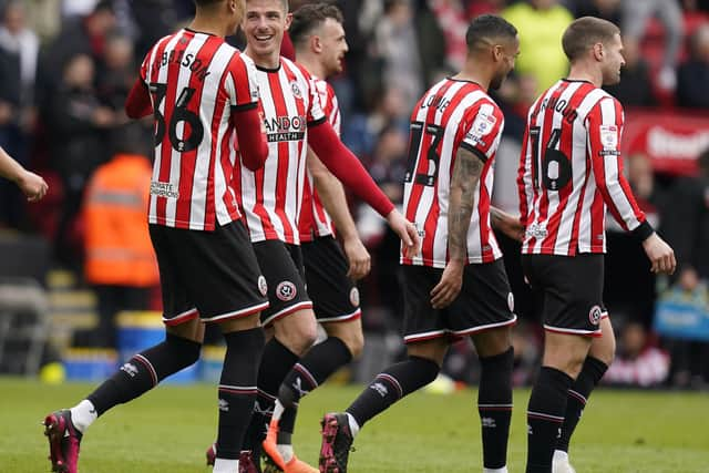 Ciaran Clark of Sheffield Utd (2L) celebrates his goal against Cardiff City: Andrew Yates / Sportimage