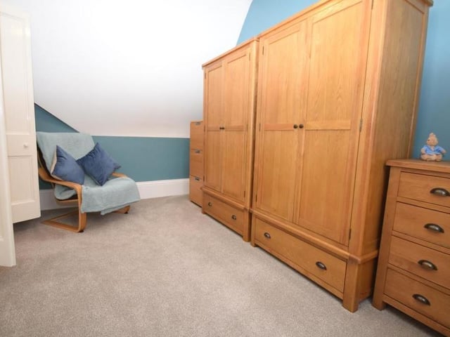 The third bedroom boasts plenty of wardrobe and storage space. It also offers fantastic views across the upper lake of Newstead Abbey Park