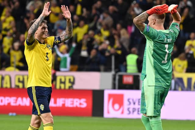 Sweden's goalkeeper Robin Olsen (R) and defender Victor Lindelof (L)react after their 2-1 win over Spain at the Friends Arena in Solna, Sweden (JONATHAN NACKSTRAND/AFP via Getty Images)
