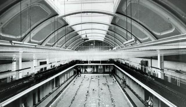 The roof of the mixed bathing pool with a net to catch the falling bts of the unsafe roof on July 3, 1969