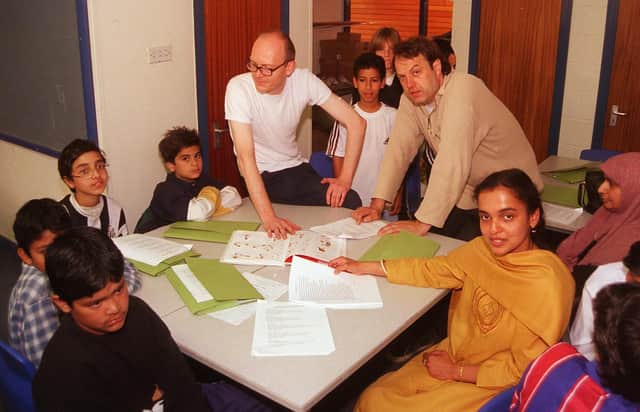 Pictured at Earl Marshall school, Sheffield, where local poets LtoR  Stuart Lodge, and Matthew Black are seen with pupils taking part in the  Poetry Slam at the summer school.