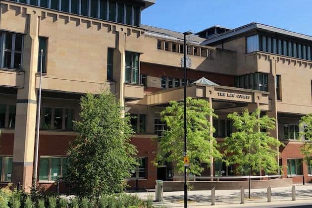 Sheffield Crown Court, pictured, has heard how two brothers have denied murdering disabled man Dean Williamson in Rotherham over the alleged theft of a mobility scooter.