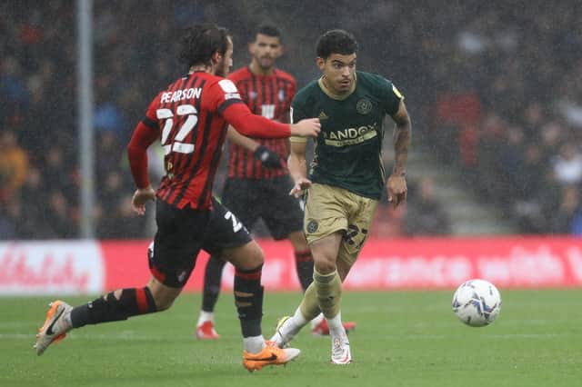 Morgan Gibbs-White of Sheffield United tries to push forward past Ben Pearson of Bournemouth: Paul Terry / Sportimage