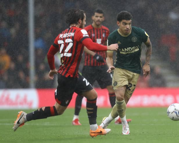 Morgan Gibbs-White of Sheffield United tries to push forward past Ben Pearson of Bournemouth: Paul Terry / Sportimage