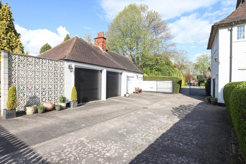 The original servants' quarters has been converted into a double garage, workshop and external store.