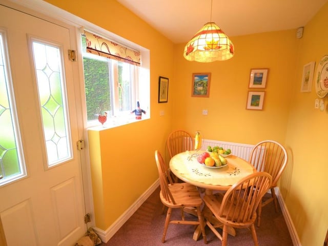 Breakfast room - A lovely addition to the kitchen having various power sockets, central heating radiator, rear facing UPVC double glazed window and a glazed composite door opens to a patio seating area and rear garden.