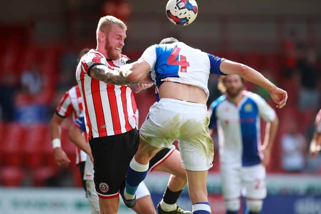 Sheffield United manager Paul Heckingbottom wants to see aggression like this, from striker Oli McBurnie: Simon Bellis/Sport Image