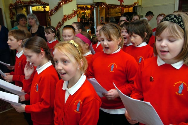 Gloria Stewart's 2008 Christmas party, pictured were students from  St Mary's Catholic Primary School singing carols  at the Civil Service Sports and Social Club