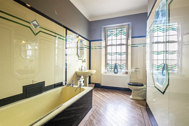 There are a total of three bathrooms in this massive home